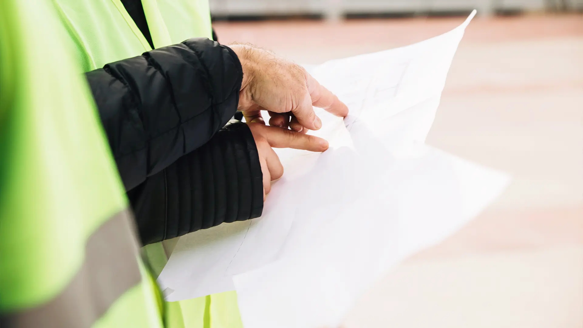 hands pointing at a forensic structural report