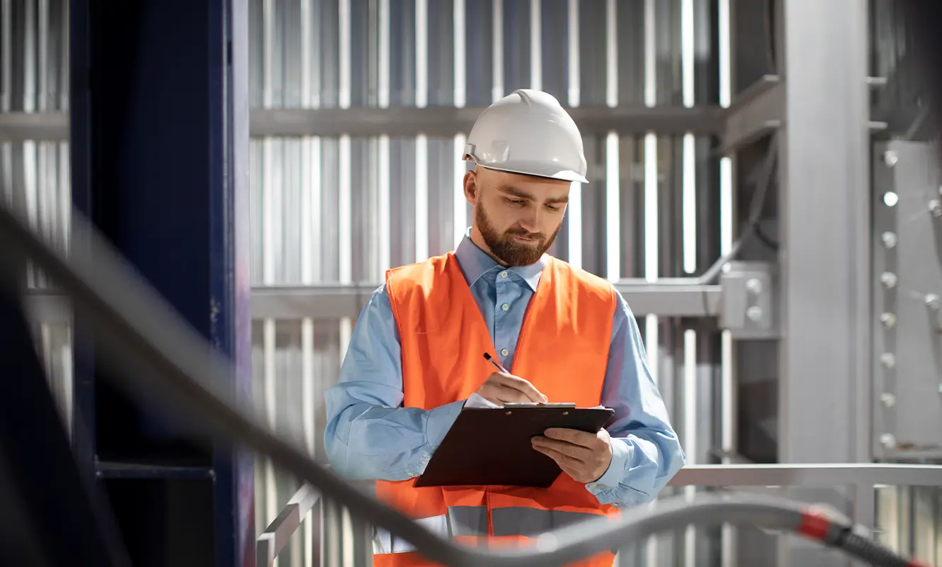 Engineering-Sydney-forensic-structural-reports Male engineer completing a forensic structural report on site