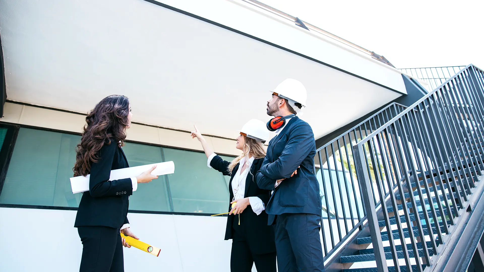 Group of project managers reviewing job site